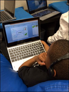 Student working on Wixie project on the sounds of the letter i